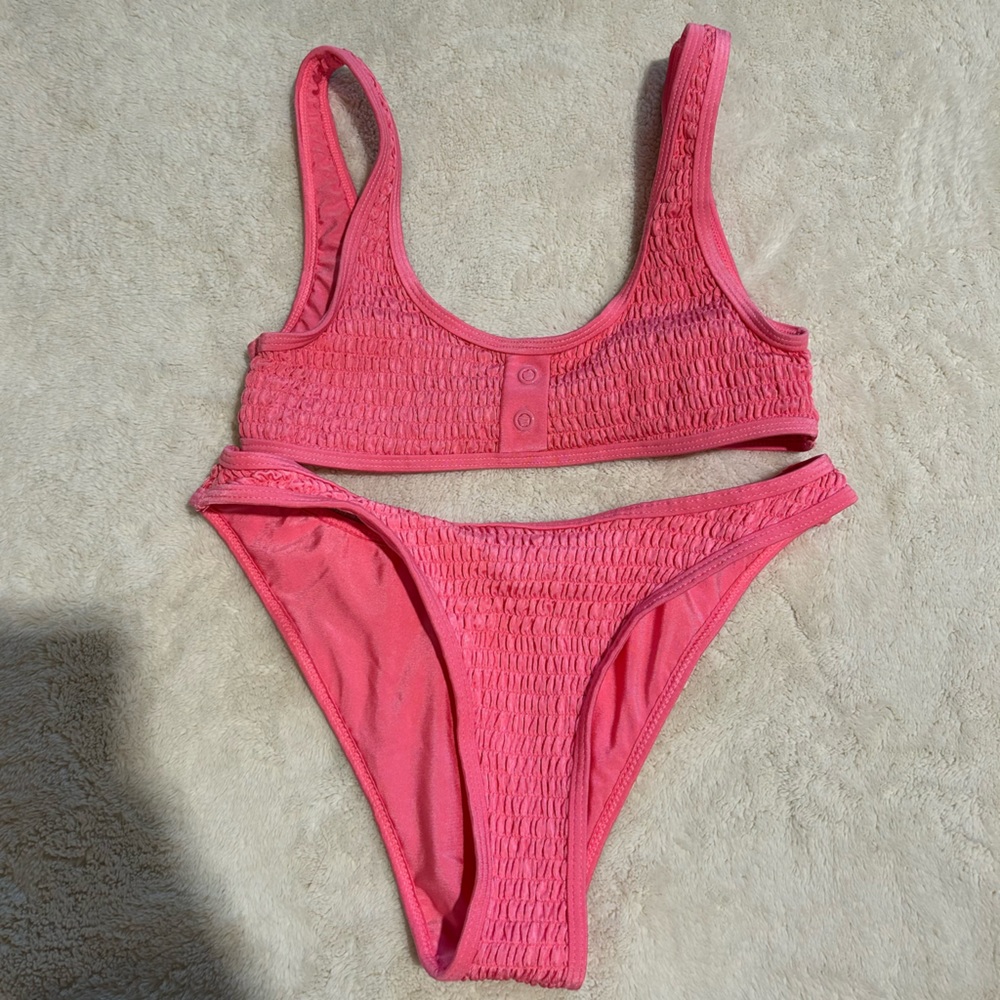 Kylie and Kendall swim.